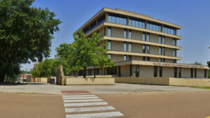 Street view of the Walter Washington Administration/Classroom Building on the campus of Alcorn State University. This image is used as a Zoom background.