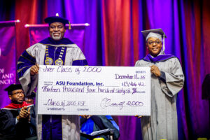 Silver Class of 2000 presents check.